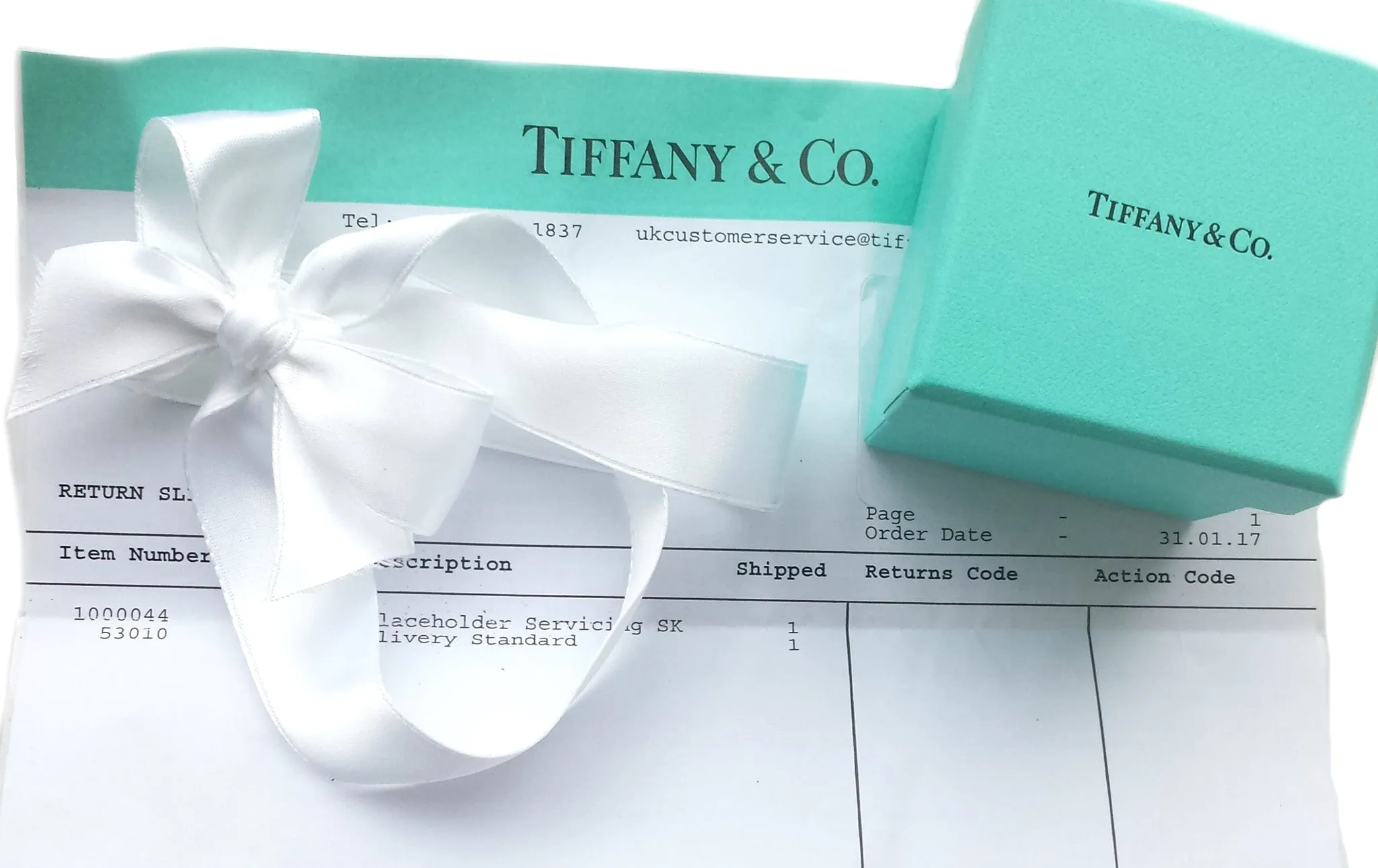 Tiffany & Co. 0.63ct H/VS2 Round Brilliant Cut Diamond Engagement Ring